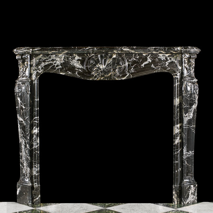 A Tall Louis XV Style Rococo Chimneypiece.