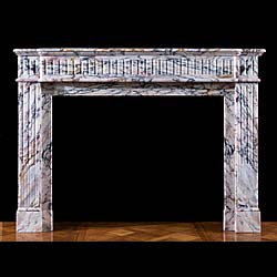 A Breche Violette Marble fireplace