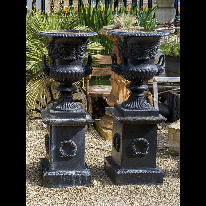 Pair of Large Cast Iron Garden Urns on Stands 